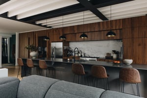 Photo of a kitchen with a large main countertop