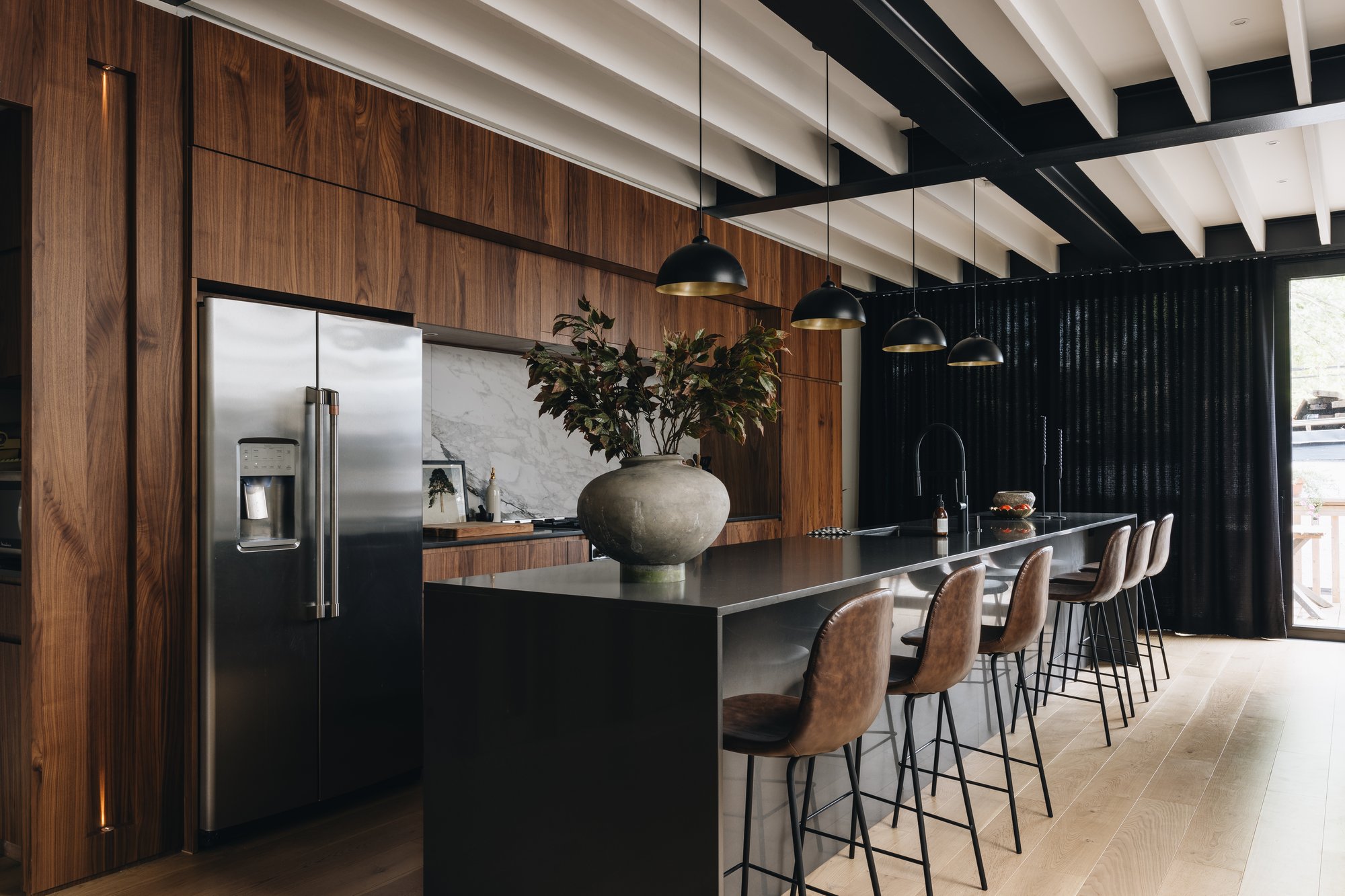 Photo of a large kitchen with a large vase on the countertop